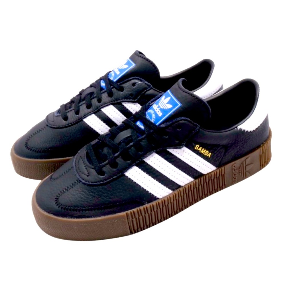 Womens Black Sambarose with chocolate brown gum soles. Barely worn. Size runs LG